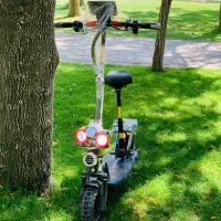 اسکوتری برقی|دوچرخه، اسکیت، اسکوتر|نمشیر, |دیوار