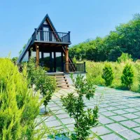 زمین-با-کلبه-سویسی-70-متری-ش-مال