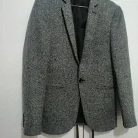 تعدادی کت مردانه