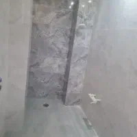 کارگر کاشیکاری  وسنگ کاری