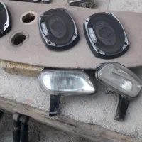 کمک گازی و باند و قالپاق موتور و پروژکتور پارس