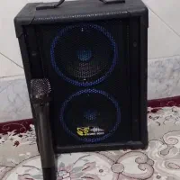 اسپیکر به همراه میکروفن