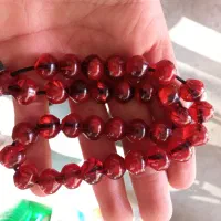 تسبیح کهربا و سندلوس. دو پوست 7عدد . روانسر