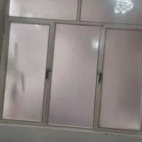 پنجره آهنی دو در