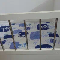 تخت کودک کنار مادر