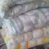 تشک دوزی و پنبه زنی