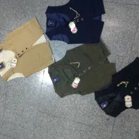 ژیله پسرانه دکمه دار پارچه کتان عمده آستین کوتاه