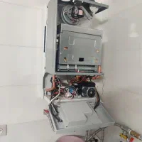 انواع خدمات تاسیساتی ساختمان راهاندازی پکیج دیوار