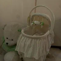 تخت نوزاد چندکاره کنار مادر خارجی