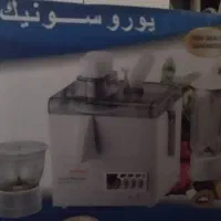 یک عدد چرخ گوشت ویک عدد آبمیوه گیری