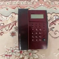 تلفن ثابت رنگ زرشکی