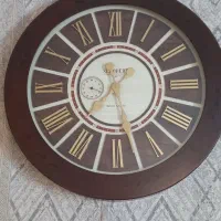 ساعت دیواری طرح چوب