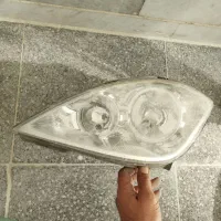 چراغ سمت راننده خودرو تیبا و سر اگزوز