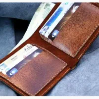 کیف قهوه‌ای حاوی مدارک به نام وحیدامیری گمشده