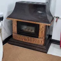 بخاری گازی مدل شومینه هیزم دار