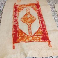 نمدیک نوع قالیچه آی که باپشم خالص گوسفندی می‌باشد