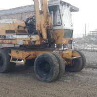 بیل مکانیکی۹۱۲لاستیکی