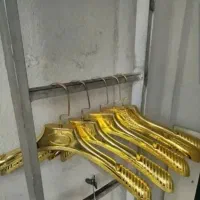 فروش چوب لباسی اپل دار طلایی وارداتی