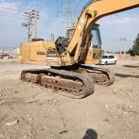 بیل میکانیکی. بعمراه چنگ و پیکر و پاکت