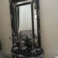 آیینه و شمعدون به همراه ساعت