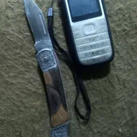 گوشی سالم وچاقوی قدیمی