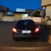 ۲۰۷ اتوماتیک ۱۴۰۳ مشکی بیرنگ ۶ سرعته سقف فلز