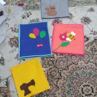دفتردوخت  پارچه ای باجلدنمدی ویژه پایه ۶ و۷ تحصیلی