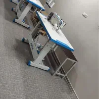 وسط کار و‌ چرخکار خانم در تولیدی پرده