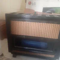 بخاری گازی به همراه دودکش و لوازم نصب در حد