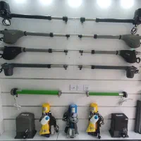 درب برقی جک بازویی در پارکینگ کرکره ریلی بالابر