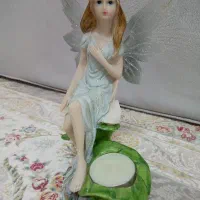 مجسمه فرشته. حضرت مریم ولکلک