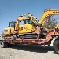 مینی بیل مکانیکی همراه با پیکور