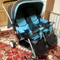 کالسکه دوقلو دو قلو دوقولو دونفره کنارهم روبه مادر