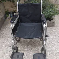 ویلچر به‌کار درحد آک