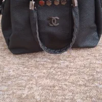 کیف مشکی در حد نو زیاد استفاده نشده ۲۰۰ هزار تومان