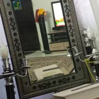 اینه و شمعدان