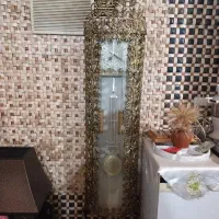 ساعت  منزل برنزی ایستاده