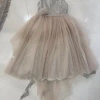 پیراهن مجلسی دنباله دار همراه با کفش بچگانه