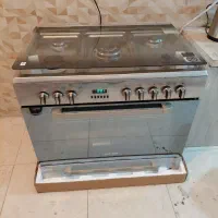 اجاق گاز فردار تمام استیل در حد نو با گارانتی