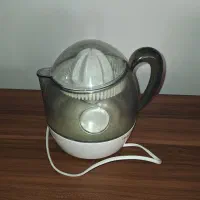 آبمیوه گیری برقی تولیپس