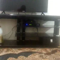 میزتلوزیون شیشه ای آرچیلیک