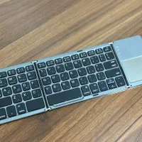 کیبورد تاشو بلوتوثی مجهز به تاچپد موس