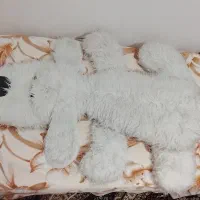 عروسک سگ خوابیده
