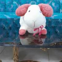 عروسک|اسباب‌بازی بچه|قم, باغ کرباسی|دیوار