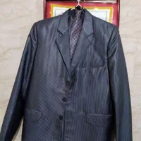 کت و شلوار و کراوات و جلیقه|لباس|لاهیجان, آهندان|دیوار