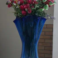 گل و گلدان مصنوعی بهمراه حلقه گل