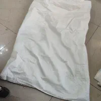 یه تعداد گونی 40 و 50 کیلویی سفید و شیشه‌ای