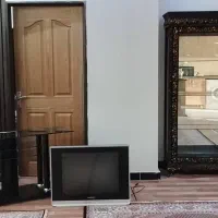 یک عدد میز تلویزیون یک عدد بوفه ویک عدد تلیوزیون