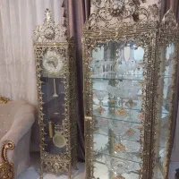 ویترین و ساعت و آیینه شمعدان