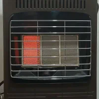 انواع بخاریهای گاز سوز کاملا سالم ویه ساعت دیواری